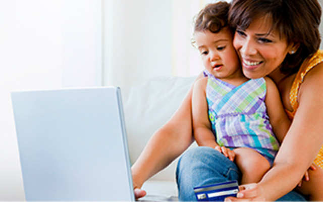 Woman and daughter on computer